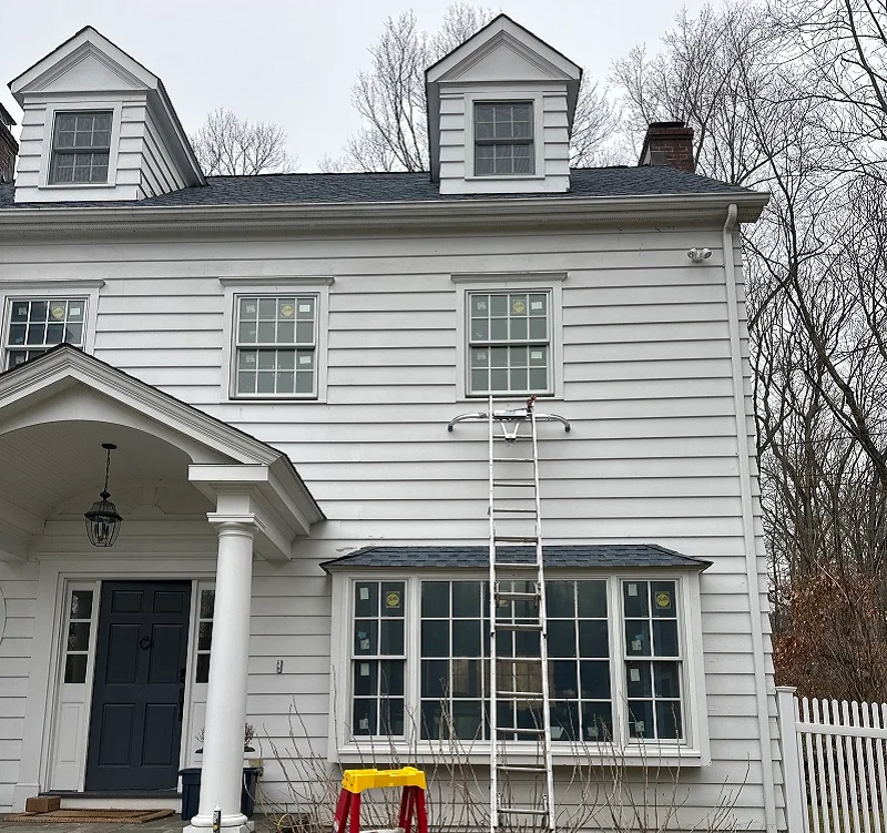 Pella Lifestyles windows with an aluminum clad exterior installed in Wilton, CT by WIndow Solutions Plus